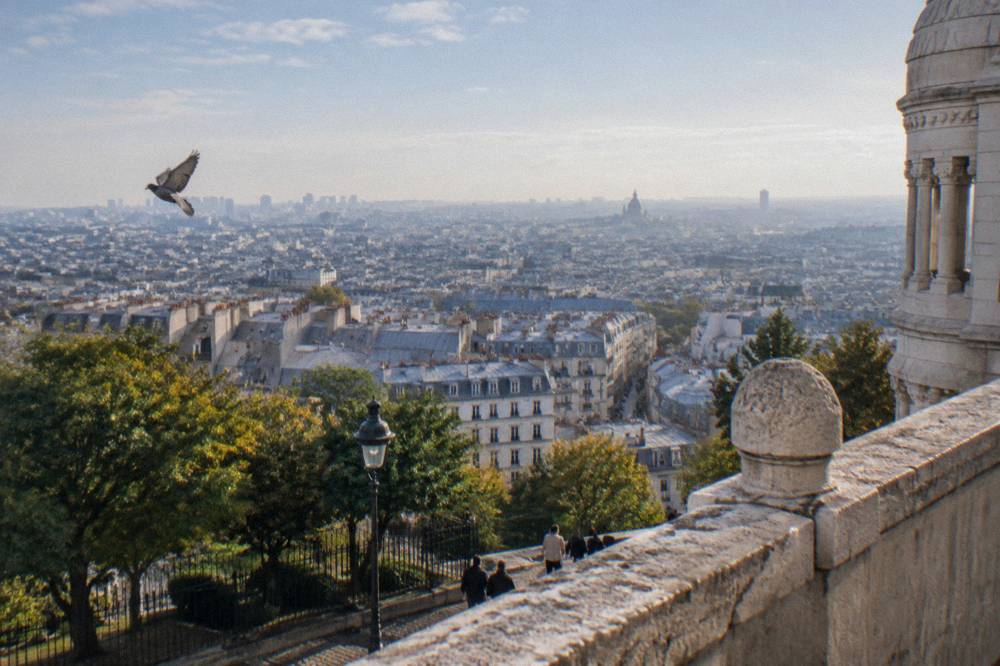 Panoramic view over Paris rooftops from the top of the Sacre-Coeur dome